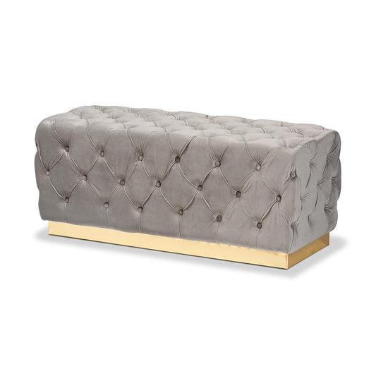 Corrine Glam and Luxe Grey Velvet Fabric Upholstered and Gold PU Leather Ottoman