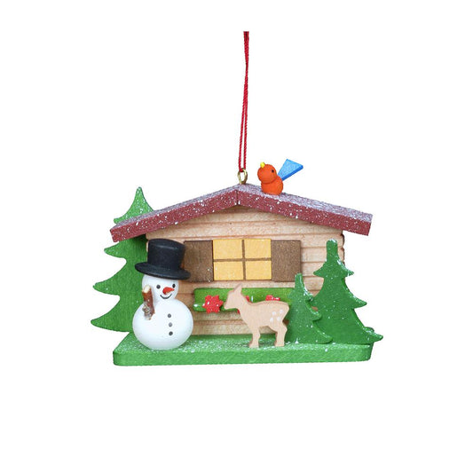 Christian Ulbricht Ornament - Cottage with Snowman - 2"H x 3.25"W x 1"D