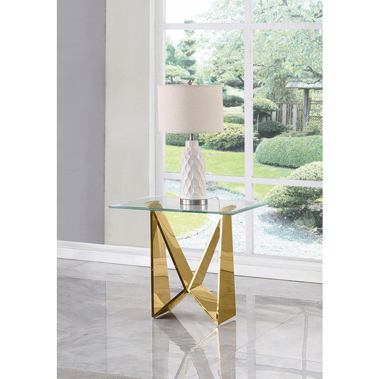 Clear glass End table with a gold color  base